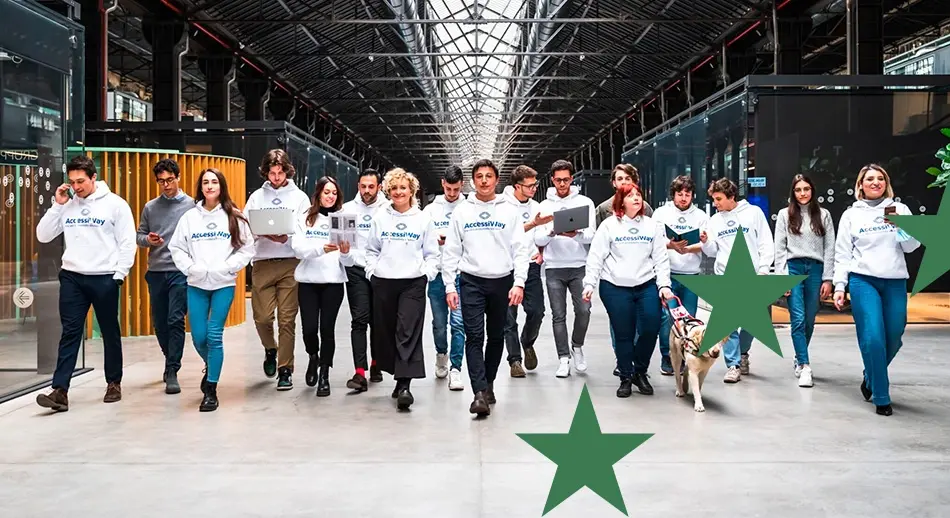 Il team di Accessiway che camminna all'interno di OGR a Torino